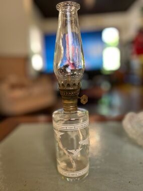 Vintage clear glass oil lamp with Eagle decoration